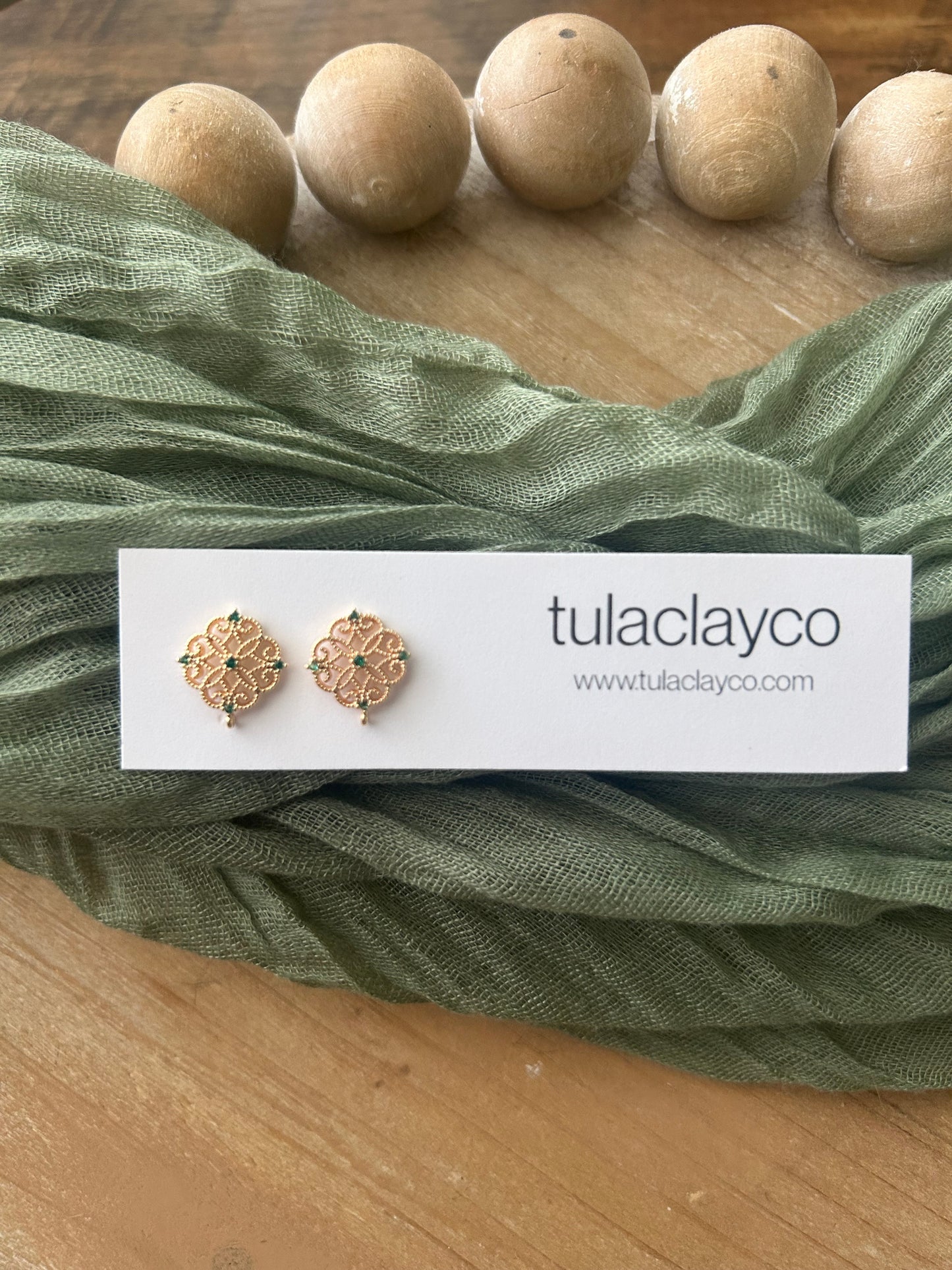 Laced Emerald Studs